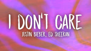 粗體白色文字「I DON'T CARE」由Justin Bieber和Ed Sheeran創作，位於色彩繽紛的抽象背景上。