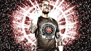 WWE摔角手CM Punk帶有紋身和星星標誌襯衫，站在火熱背景前。