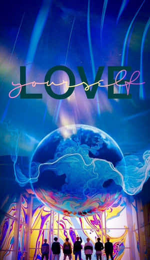 人們在發光星球下的剪影，上方有LOVE字樣在宇宙空間中。 — Galaxy Tab A11 壁紙