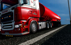 日落時分高速公路上紅色Scania Super油罐車。