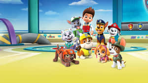 Paw Patrol 小狗和萊德在他們的指揮中心準備行動。