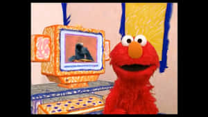Elmo 坐著，在一個色彩繽紛的插圖房間裡，看著一部手繪電視播放卡通。