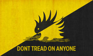 盤繞響尾蛇符號，帶有「DONT TREAD ON ANYONE」文字，位於黃色和黑色背景上。