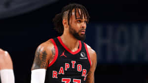 比賽期間身穿Raptors球衣並有紋身的職業籃球運動員。