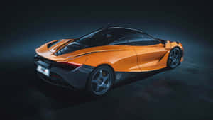 橙色McLaren 720S跑車在工作室中，帶有戲劇性燈光。 — 汽車 壁紙