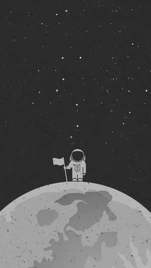 太空人在星空下的月球表面插旗