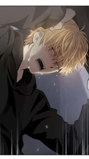 一個在雨中哭泣的金髮動漫男孩。