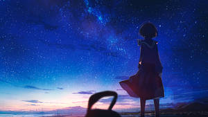 動漫女孩穿著校服獨自站在海岸邊的星空下。