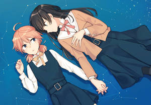 兩個穿著校服的動畫女孩在星星和星座之間漂浮。