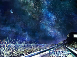 鐵路軌道通向一個車站，上方是星空夜空，有一彎新月。 — 夜晚 GIF 壁紙