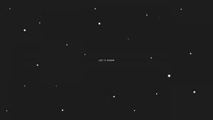 深色背景，白色圓點和文字讓它下雪