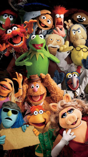 一群快樂的色彩繽紛Muppet角色一起擺姿勢。