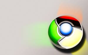 光滑的Google Chrome標誌，在灰色背景上帶有彩色燈光效果。