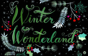 Winter Wonderland 文字以冬青漿果、松針和雪花裝飾，背景為黑色。