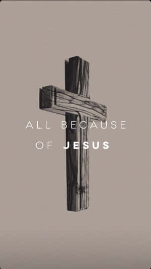 一個帶有文字 All Because of Jesus 的木製十字架。