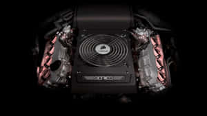特寫黑色Corsair Series CPU散熱器，在深色引擎上有粉紅色亮點。