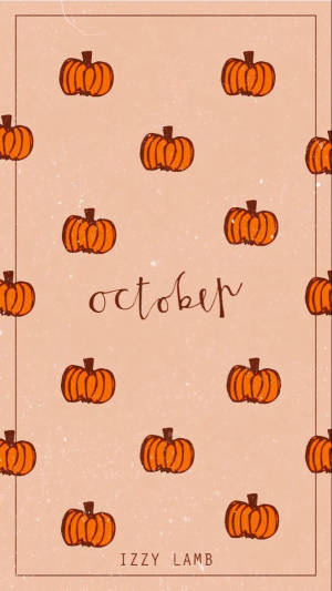 南瓜圖案牆紙，在有紋理的桃色背景上以草書寫有「October」字樣。