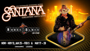 Santana 在 House of Blues Las Vegas 現場演出，背景是霓虹城市。