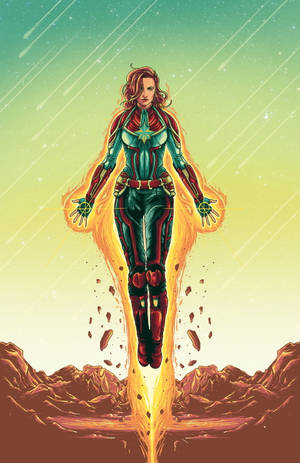Captain Marvel 喺能量光束上漂浮喺沙漠上空，天空有星星。