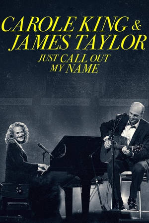 Carole King 和 James Taylor 在舞台上用鋼琴和結他演奏音樂。 — 音樂 GIF 壁紙
