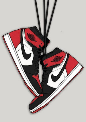 紅、黑、白色Jordan 1波鞋用鞋帶掛在灰色背景上。