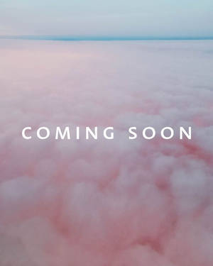 粉紅與白色雲朵，帶有「COMING SOON」文字疊加。