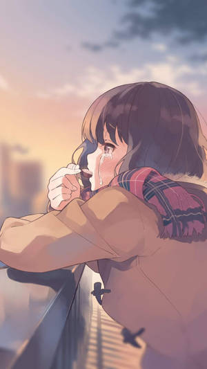 動漫女孩在日落時分的陽台上哭泣，身後是城市景觀。 — 可愛動漫女仔 壁紙