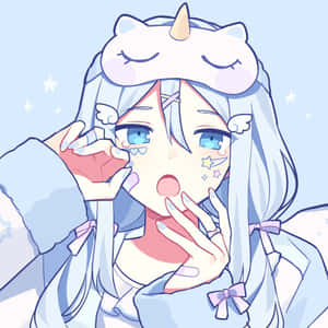 銀色頭髮和獨角帽的動漫女孩拿著一個心形物體。