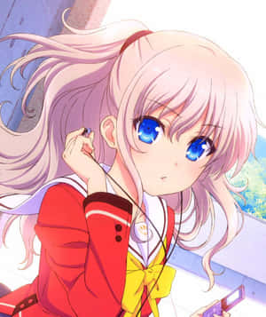 穿著紅色校服的動漫女孩戴著耳機聽音樂。