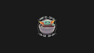 Baby Yoda 在吊艙中，黑色背景上有「Baby Yo-Da Da」文字