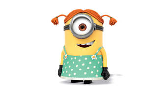 一個黃色Minion，有橙色辮子和綠色圓點裙，正在微笑。