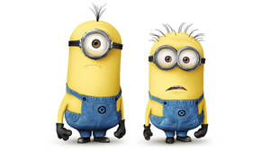 兩隻黃色卡通Minions，身穿藍色工人褲和護目鏡，表情豐富。