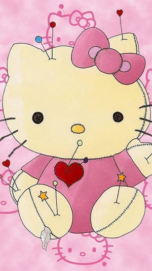 縫製的Hello Kitty毛絨玩具，帶有別針和心形，背景為粉紅色。