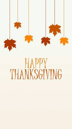 五片懸掛的秋葉在奶油色背景上的「Happy Thanksgiving」文字上方。