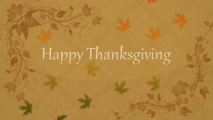 Happy Thanksgiving 文字被秋葉和裝飾藤蔓環繞在溫暖的背景上。