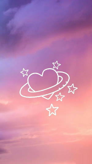 粉紫色天空中的心形行星，帶有光環和星星 — 心形美學 壁紙