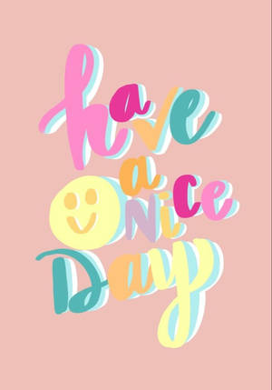 粉紅色背景上帶有笑臉的彩色3D字母，寫著「have a nice day」。