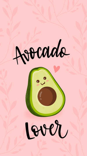 一個微笑的牛油果插圖，在粉紅色背景上帶有文字「avocado lover」。 — 粉紅 壁紙