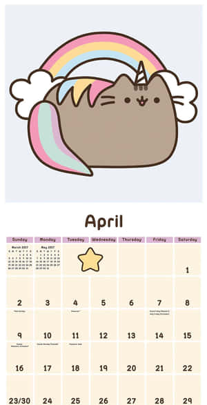 一隻有彩虹角和尾巴的卡通貓，在2017年4月的日曆上方。