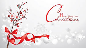 紅絲帶綁在漿果枝上，帶有雪花和「Have a Merry Little Christmas」文字。
