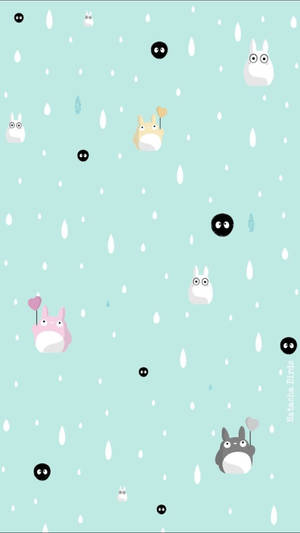 龍貓角色在雨中漂浮在薄荷背景上