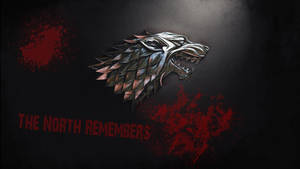 金屬冰原狼頭，帶有紅色血濺和文字 The North Remembers。 — 權力遊戲 第八季 壁紙