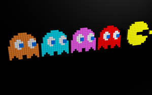 五個像素化 Pacman 鬼魂在黑色背景上排成一排。 — 攻殼機動隊 GIF 壁紙