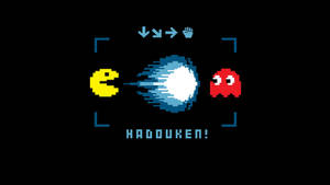 Pacman 以像素藝術風格向紅色鬼魂發射藍色波動拳。 — 黑屏 壁紙