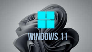 Windows 11 標誌搭配旋轉灰色抽象背景