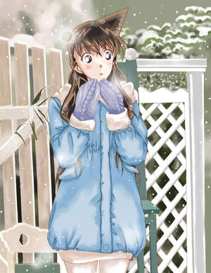 穿著藍色冬季外套和紫色手套的動漫女孩對飄落的雪花感到驚訝。