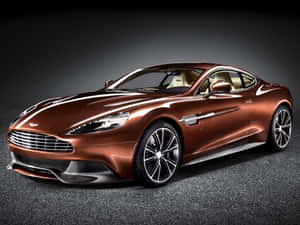 攝影棚燈光下的時尚銅色Aston Martin跑車。