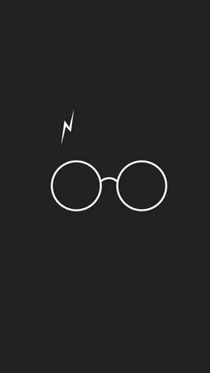 黑色背景上，圓形眼鏡上方有閃電的白色輪廓。 — 哈利波特 美學 GIF 壁紙