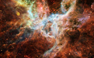 充滿活力的宇宙星雲，旋轉的紅色和藍色充滿了星星。 — 星際寶貝 壁紙