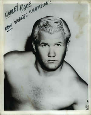 摔角手 Harley Race 的肖像照，以手寫文字標記為「New World's Champion」。 — 復古gif 壁紙